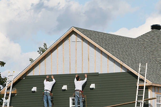 Professional Siding Contractor technician working in Alverton, PA